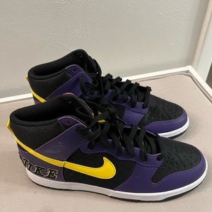 Nike tennis shoes in purple and black for men size 11.5